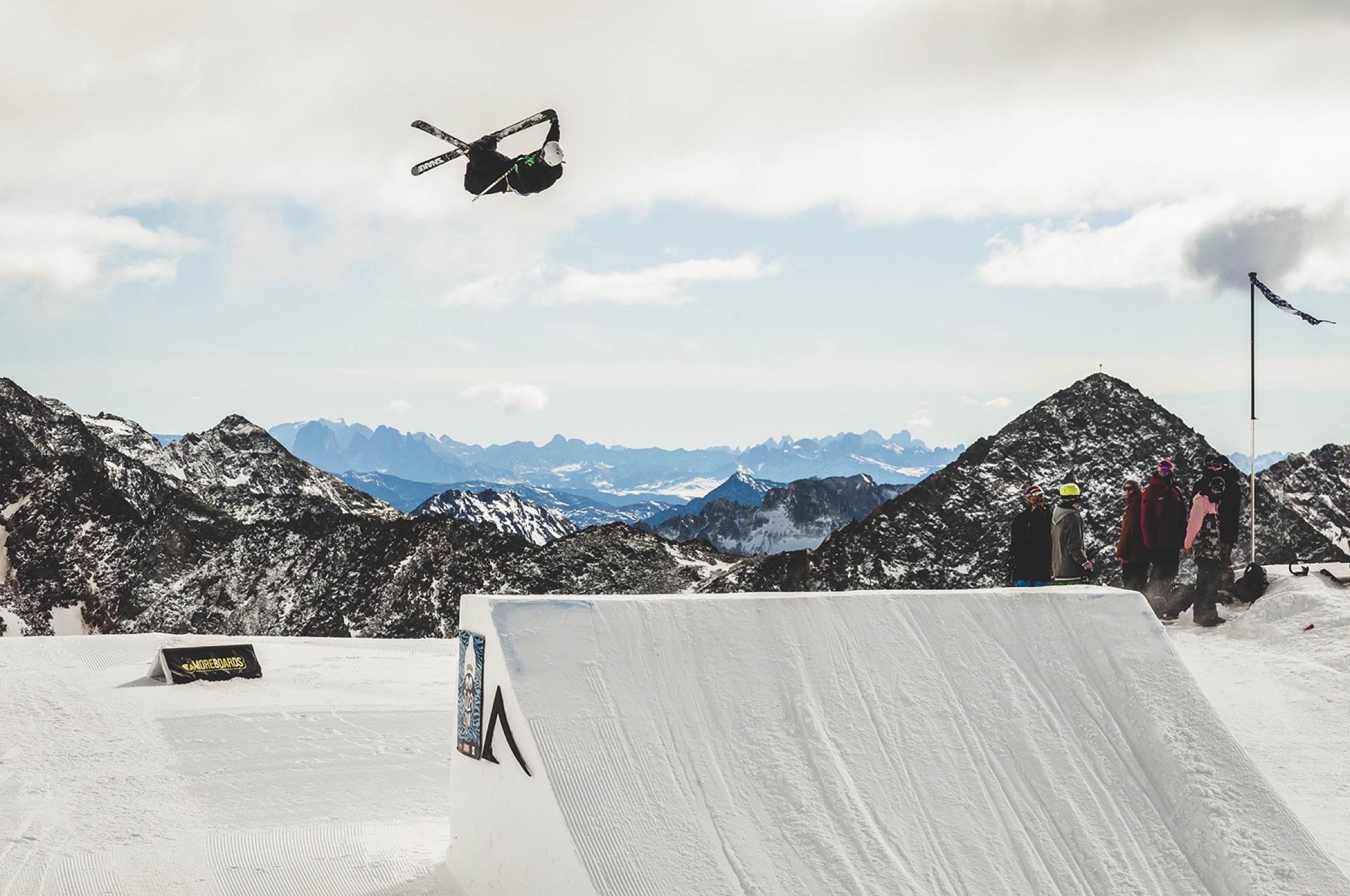 Bartek Sibiga freestyle skiing cork 7 grab over a snow park jump